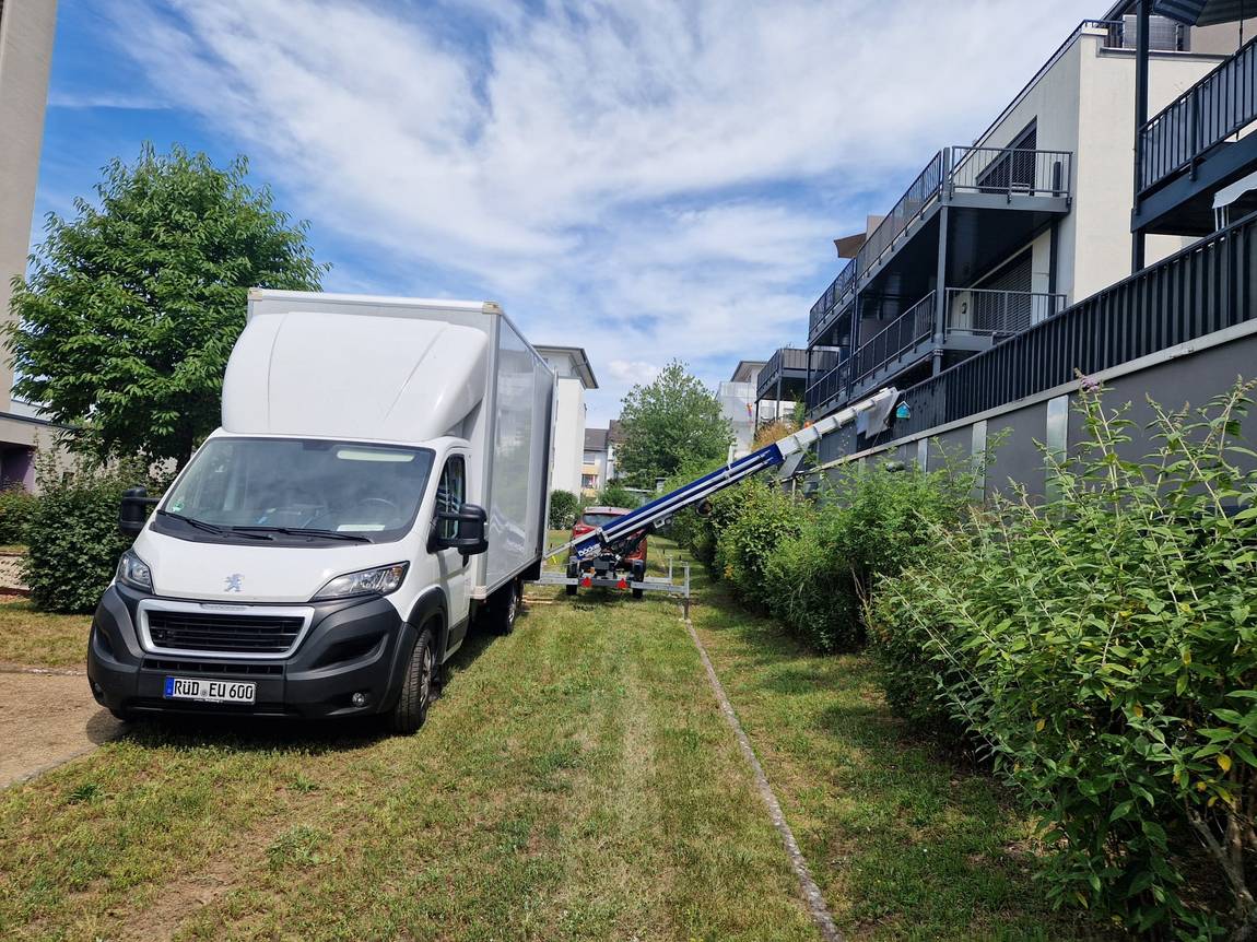 Moving boxes and furniture ride safely to the top